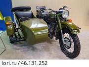 Old motorcycle with sidecar, restored, is standing indoors. Illustrative editorial: Ufa, Russia - April 2, 2019. Редакционное фото, фотограф Зарифа Арсланова / Фотобанк Лори