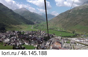 Андерматт и Альпы из кабинки фуникулера. Швейцария. Лето. Июль. Andermatt and the Alps from the cable car. Switzerland. Summer. July. Стоковое видео, видеограф Горшков Александр / Фотобанк Лори