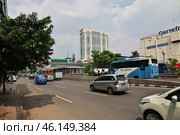 Jakarta / Indonesia - 29 Jul 2016: The street in Jakarta city, Indonesia. Редакционное фото, фотограф Сергей Стрелков / Фотобанк Лори