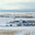 Expansive winter vista of industrial drilling rig complex amid snow-covered plain, featuring crew accommodation units and operational equipment. Стоковое фото, фотограф Владимир Ендовицкий / Фотобанк Лори