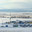 Expansive winter vista of industrial drilling rig complex amid snow-covered plain, featuring crew accommodation units and operational equipment. Стоковое фото, фотограф Владимир Ендовицкий / Фотобанк Лори