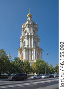 Новоспасский монастырь в Москве, Россия. Надвратная колокольня с церковью Сергея Радонежского и Спасо-Преображенский собор (2024 год). Стоковое фото, фотограф Елена Коромыслова / Фотобанк Лори