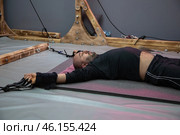 A patient relaxes during a spinal stretching alternative therapy session. Стоковое фото, фотограф Юрий Поздников / Фотобанк Лори