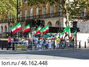 Iranian Activists Protest with Flags and Banners for Political Change. London, UK, 9 July 2023. Редакционное фото, фотограф Zydrius Tartenis / Фотобанк Лори