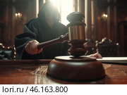 A female judge presides over a courtroom, asserting justice with a gavel during an important trial in a grand setting. Стоковое AI-изображение, AI-художник Sergey Grishin / Фотобанк Лори