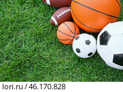 Set of sport equipment on green grass. Стоковое фото, фотограф Pixel_shot / Фотобанк Лори