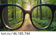 Pair of black glasses is shown with the sun shining through the lens. Стоковое AI-видео, аниматор Sergey Grishin / Фотобанк Лори
