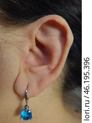 Ухо с серёжкой, топаз. Лор, ушная раковина. Ear with an earring, topaz. ENT, auricle. Стоковое фото, фотограф Юрий Пуликов / Фотобанк Лори