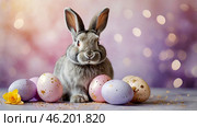 The concept of a bright Easter holiday. Delicate Easter eggs, a gray rabbit and tulip flowers on a pastel watercolor background with delicate veins. Стоковое AI-изображение, AI-художник Photojuli / Фотобанк Лори