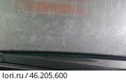 Robotized car washing view from car. Car coating with protective layer of wax for repulsing dirt and protecting body of car. Стоковое видео, видеограф Скрипачев Антон / Фотобанк Лори