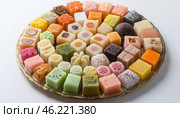 Colorful wagashi assortment showcasing japanese confectionery artistry. Стоковое AI-изображение, AI-художник Юрий Поздников / Фотобанк Лори