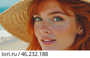 Charming red-haired female with freckles on sea beach. Beautiful smiling young woman in straw hat in summer by sea. Portrait, close-up. Стоковое AI-видео, аниматор Ирина / Фотобанк Лори