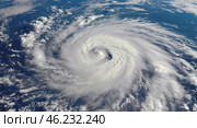 A cyclone above the surface. Illustrated photo of the cyclone. View from space, hurricane swirling over ocean, Earth’s blue surface beneath, violent winds. Стоковое AI-изображение, AI-художник Антон Слабоспицкий / Фотобанк Лори
