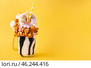 Delicious freak shake on color background. Стоковое фото, фотограф Pixel_shot / Фотобанк Лори