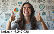 Woman is smiling and giving thumbs up in front of a wall with various drawings. Стоковое AI-видео, аниматор Sergey Grishin / Фотобанк Лори