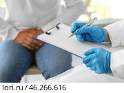 Male urologist with patient at hospital, closeup. Стоковое фото, фотограф Pixel_shot / Фотобанк Лори