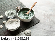 Bowls with cosmetic clays on light table. Стоковое фото, фотограф Pixel_shot / Фотобанк Лори