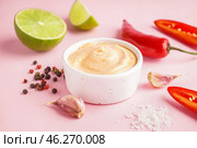 Bowl of tasty chipotle sauce on pink background. Стоковое фото, фотограф Pixel_shot / Фотобанк Лори
