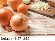 Fresh raw onion on wooden table. Стоковое фото, фотограф Pixel_shot / Фотобанк Лори