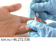 Doctor using lancet to get blood sample for test, closeup. Стоковое фото, фотограф Pixel_shot / Фотобанк Лори