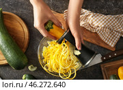 Woman making zucchini spaghetti, closeup. Стоковое фото, фотограф Pixel_shot / Фотобанк Лори