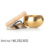 Tibetan singing bowl with karatalas on white background. Стоковое фото, фотограф Pixel_shot / Фотобанк Лори