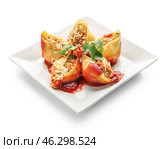 Plate with tasty conchiglioni pasta on white background. Стоковое фото, фотограф Pixel_shot / Фотобанк Лори