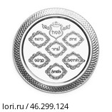 Passover Seder plate on white background. Стоковое фото, фотограф Pixel_shot / Фотобанк Лори