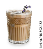 Glass of tasty lavender latte on white background. Стоковое фото, фотограф Pixel_shot / Фотобанк Лори
