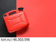 Plastic jerrycan on color background. Стоковое фото, фотограф Pixel_shot / Фотобанк Лори