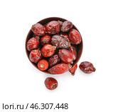 Bowl with rose hips on white background. Стоковое фото, фотограф Pixel_shot / Фотобанк Лори