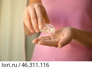 Woman using antibacterial hand gel, closeup. Стоковое фото, фотограф Pixel_shot / Фотобанк Лори