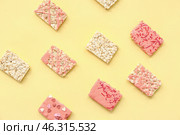 Crispy rice bars on color background. Стоковое фото, фотограф Pixel_shot / Фотобанк Лори