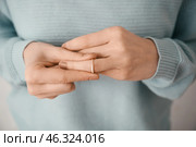 Woman taking off her wedding ring, closeup. Стоковое фото, фотограф Pixel_shot / Фотобанк Лори