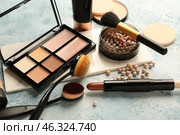 Set of cosmetics for contouring makeup on color background. Стоковое фото, фотограф Pixel_shot / Фотобанк Лори