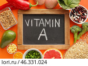 Healthy products rich in vitamin A on color background. Стоковое фото, фотограф Pixel_shot / Фотобанк Лори