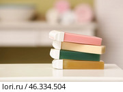 Liposoluble wax cartridges on table in bathroom. Стоковое фото, фотограф Pixel_shot / Фотобанк Лори