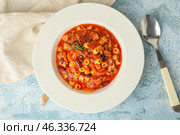 Bowl with tasty pasta and beans on color background. Стоковое фото, фотограф Pixel_shot / Фотобанк Лори