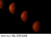 Stroboscopic photo of moving ball on dark background. Стоковое фото, фотограф Pixel_shot / Фотобанк Лори