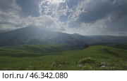 Mountain landscape with sun rays. Стоковое видео, видеограф Михаил Коханчиков / Фотобанк Лори