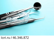 Dental instruments and occlusal splint on color background, closeup. Стоковое фото, фотограф Pixel_shot / Фотобанк Лори