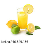 Glass of fresh lemon juice on white background. Стоковое фото, фотограф Pixel_shot / Фотобанк Лори