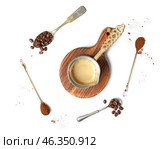 Jezve with hot coffee and spoons on white background. Стоковое фото, фотограф Pixel_shot / Фотобанк Лори