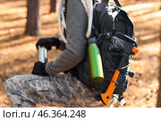 Male tourist with thermos in forest. Стоковое фото, фотограф Pixel_shot / Фотобанк Лори