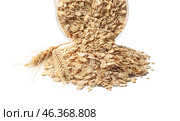 Overturned glass jar with raw oatmeal on white background, closeup. Стоковое фото, фотограф Pixel_shot / Фотобанк Лори