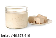 Jar with fresh sourdough and yeast on white background. Стоковое фото, фотограф Pixel_shot / Фотобанк Лори