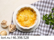 Ramekin with tasty julienne on light background. Стоковое фото, фотограф Pixel_shot / Фотобанк Лори