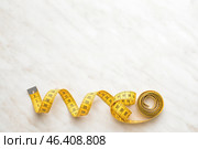 Measuring tape on light background. Стоковое фото, фотограф Pixel_shot / Фотобанк Лори