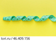 Measuring tape on color background. Стоковое фото, фотограф Pixel_shot / Фотобанк Лори