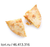 Halves of baked meat empanada on white background. Стоковое фото, фотограф Pixel_shot / Фотобанк Лори